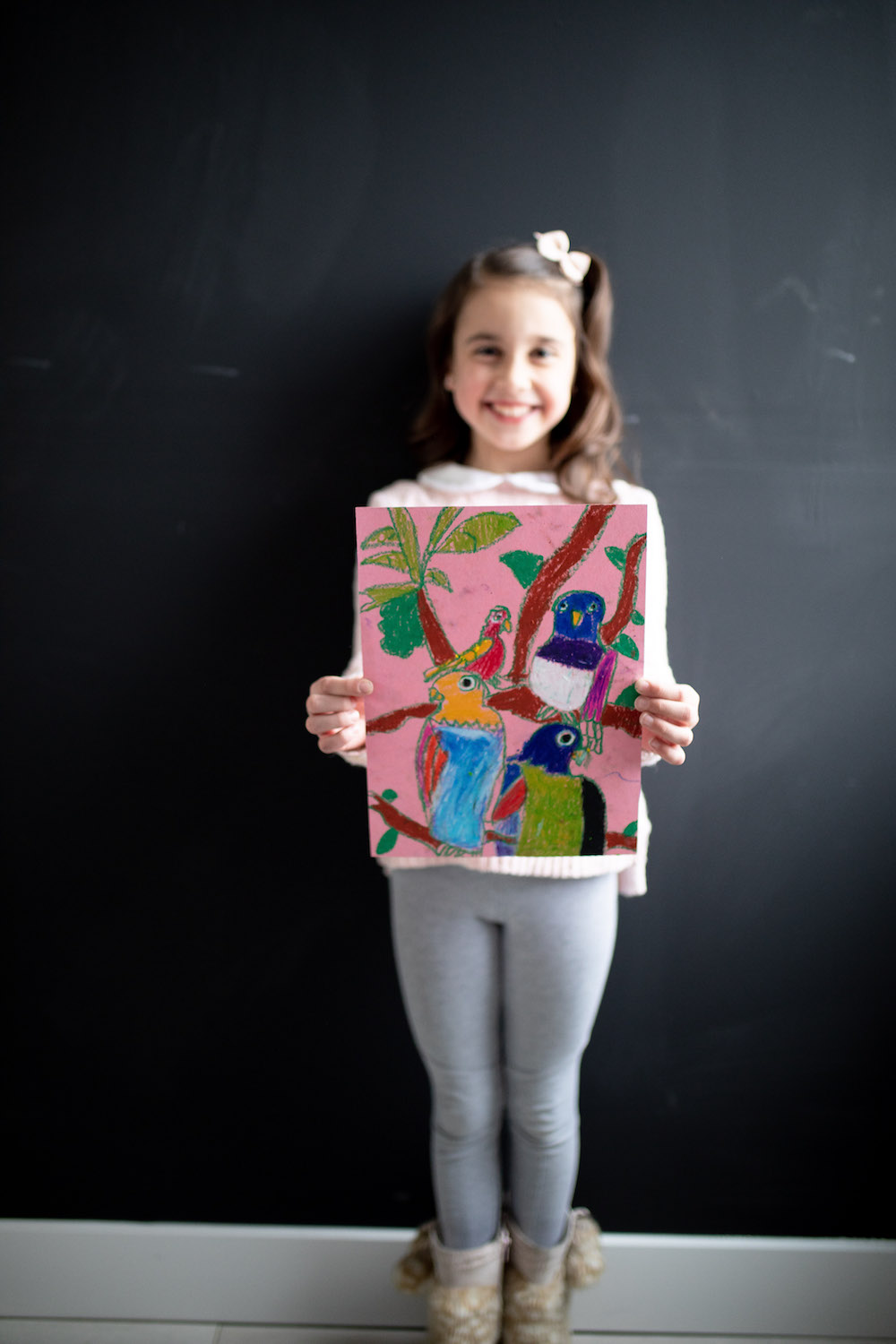 student reviewing art from digital video